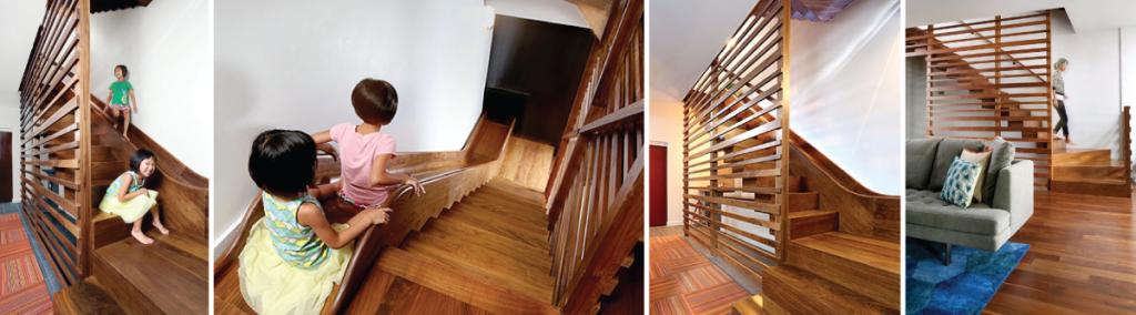A Custom Walnut Stair and Slide Hybrid in Chicago
